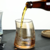 Vertical-ribbed crescent-shaped cup