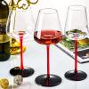 Red-stemmed wine glass